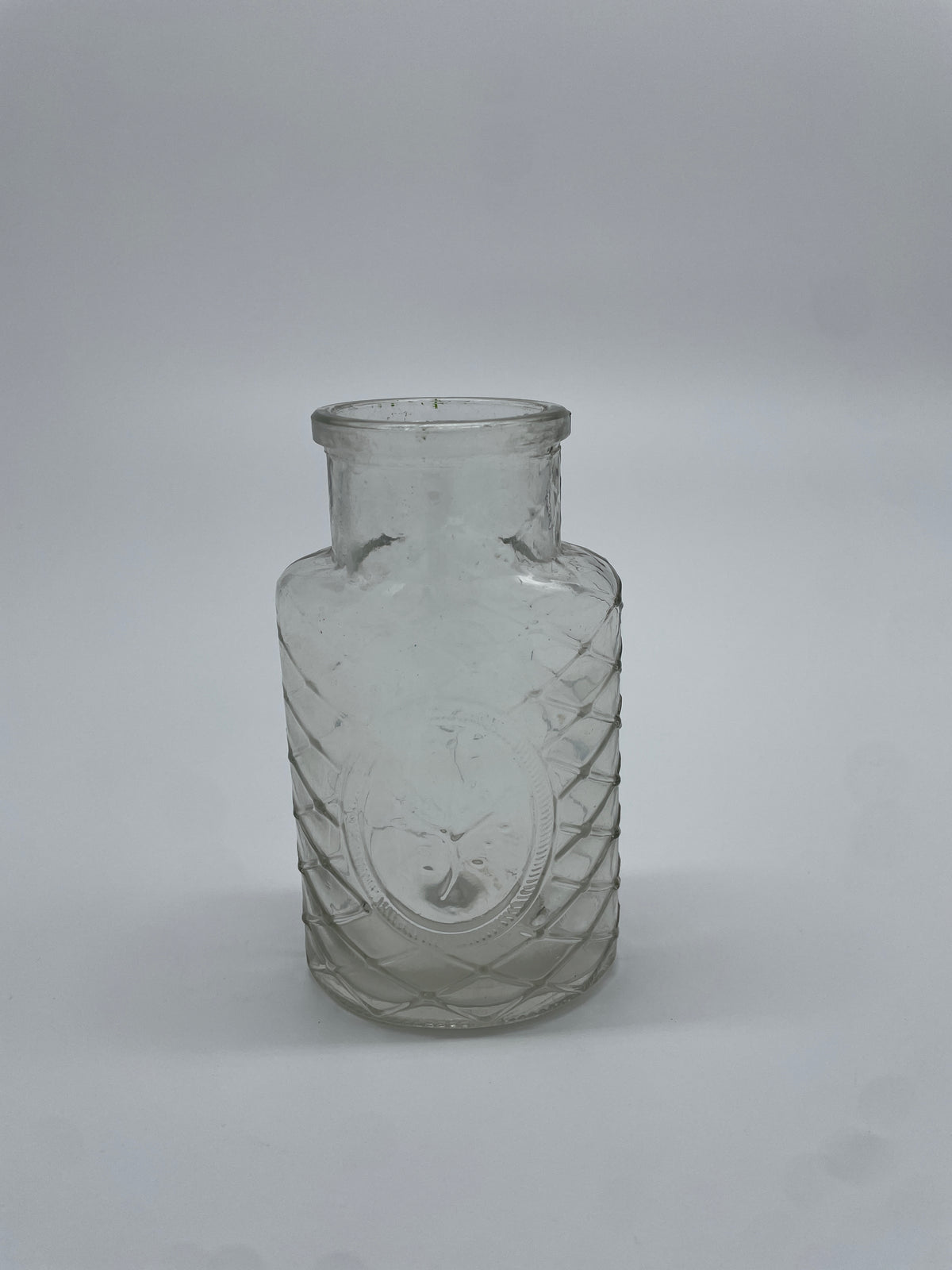 Vintage Clear Glass Bottle with Diamond Lattice & Embossed Tree Medallion